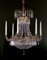 A glorious traditional sparkling crystal chandelier sets the mood, a ceiling lamp for every home